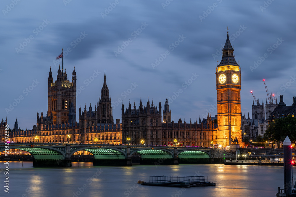 Obraz premium Long exposure of the Houses of Parliament over Westminster Bridge & River Thames in London, England. Taken on the 16th August 2026