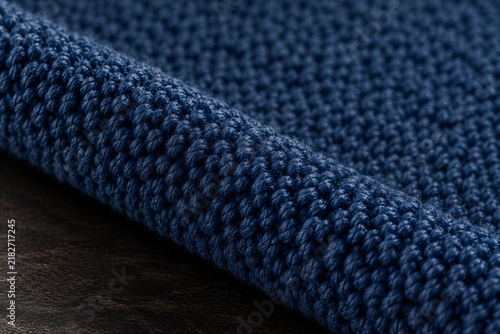 Blue carpet fiber — loop pile.