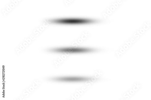 Three black oval shadows isolated on transparent background in vertical arrangement with soft blurred edges