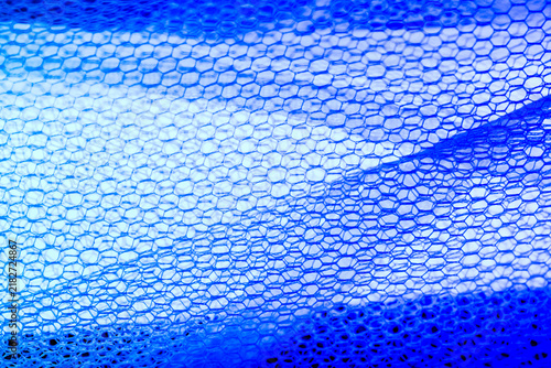 Textured fabric with color gradient symbolizing transition, warm