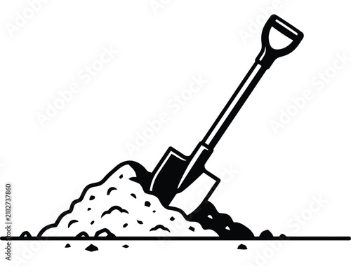 Black and white shovel digging into a pile of dirt