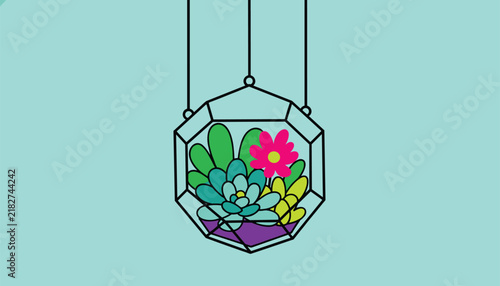 Geometric glass terrarium hanging from thin cords and holding green succulents with a single pink flower inside.