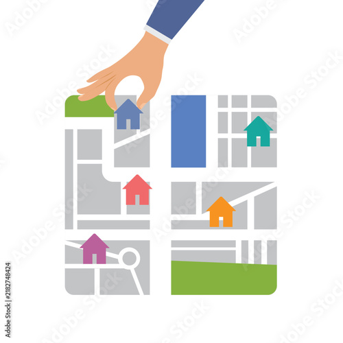 Human hand putting houses on the map, real estate business