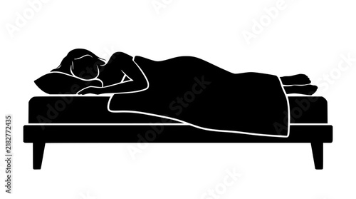 Silhouette of person sleeping peacefully on a bed