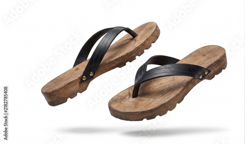 Pair of stylish black leather flip flops with wooden soles isolated on white background