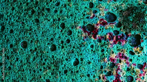 Abstract green textured surface with pores