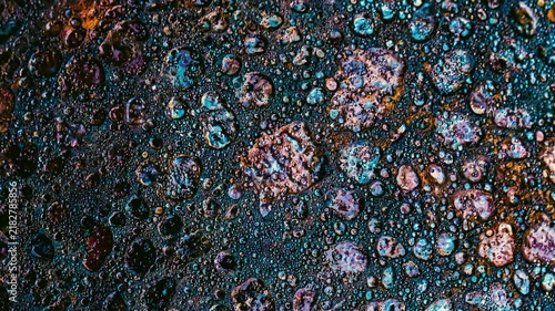 Abstract concrete texture with colorful inclusions
