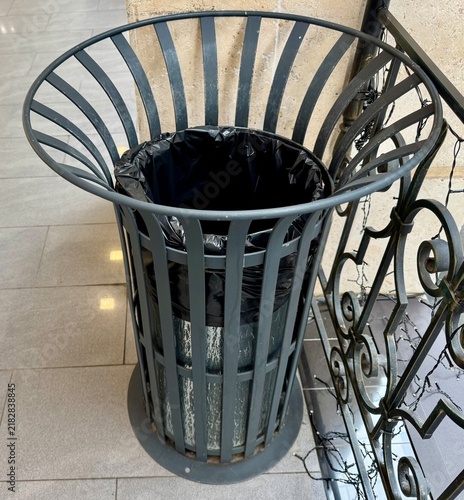 A trash can in a shopping center