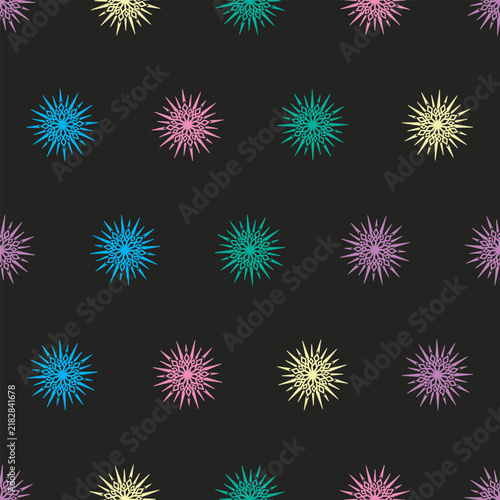 Seamless Starburst Pattern in Pastel Colors on Dark Background