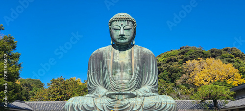 Fotografie Great Buddha of Kamakura Under Blue Sky in Japan