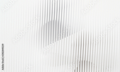 Abstract pattern of vertical lines with overlapping shadows, creating a sense of depth and layered structure