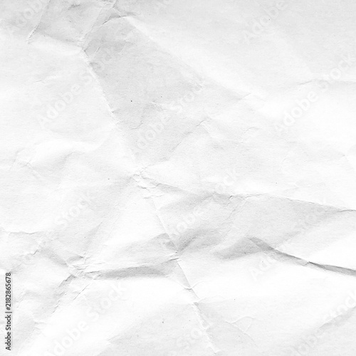 White paper texture with subtle folds, creases, and soft shadows on a clean surface. Ideal for stationery, branding, websites, posters, packaging, and editorial layouts.