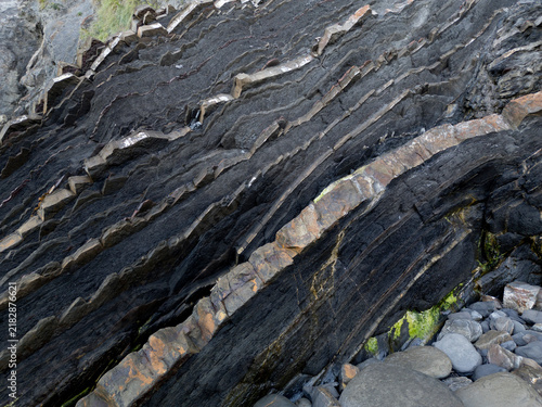 Obraz na płótnie Black Flysch with Thin-Bedded Turbidite Sandstone Layers Near Deba, Spain