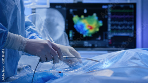 Cardiologist performing catheter ablation procedure for cardiac arrhythmia treatment
