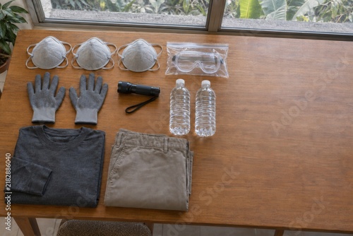 Volcanic Ash Emergency Protection Kit on Wooden Table