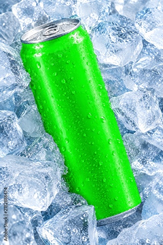 Green aluminum drink can lying in ice cubes cold beverage mockup product shot