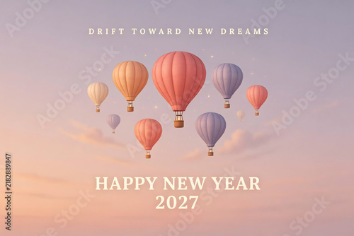 Multiple hot air balloons drifting in a soft pastel sunset sky with new year 2027 greeting text for seasonal holiday celebration card