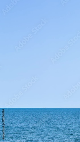 Turquoise ripple water reflection in tropical beach. Blue ocean waves. Summer sea. Waves in motion