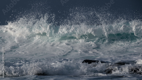 Powerful Ocean Wave Breaking with White Foam and Sea Spray
