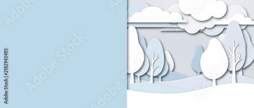 Paper cut illustration of winter landscape with trees, clouds, and blue sky background