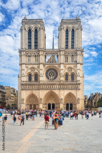Notre-Dame de Paris Cathedral with crowds on Place Jean-Paul II, Paris, France