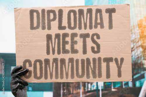 Obraz na plátně "Diplomat meets community" Diplomat meets community but makes no binding promises