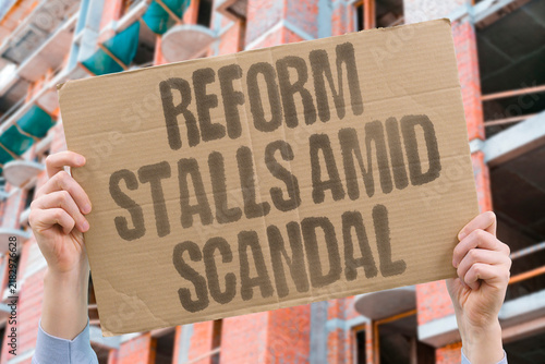 Konstfotografi "Reform stalls amid scandal" Progress on structural changes halts during corruption revelations