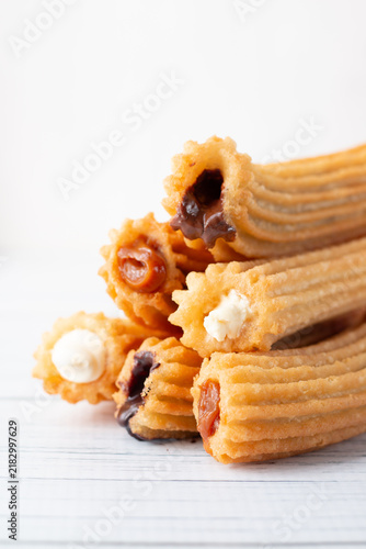 Churros filled with chocolate dulce de leche and cream