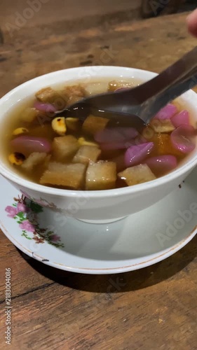Vertical Shot of Traditional Javanese Wedang Ronde Ginger Soup with Rice Balls