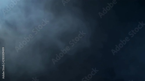 Soft white smoke swirls on black.
