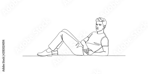 Bild auf Leinwand Continuous single line drawing of a young man lying down relaxed and looking at