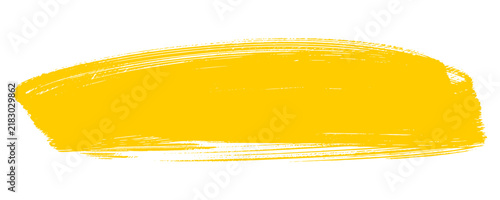 Bright yellow brush stroke paint on white background. Modern hand painted grunge paintbrush texture clip art isolated for banner highlight, header frame box, and graphic design.