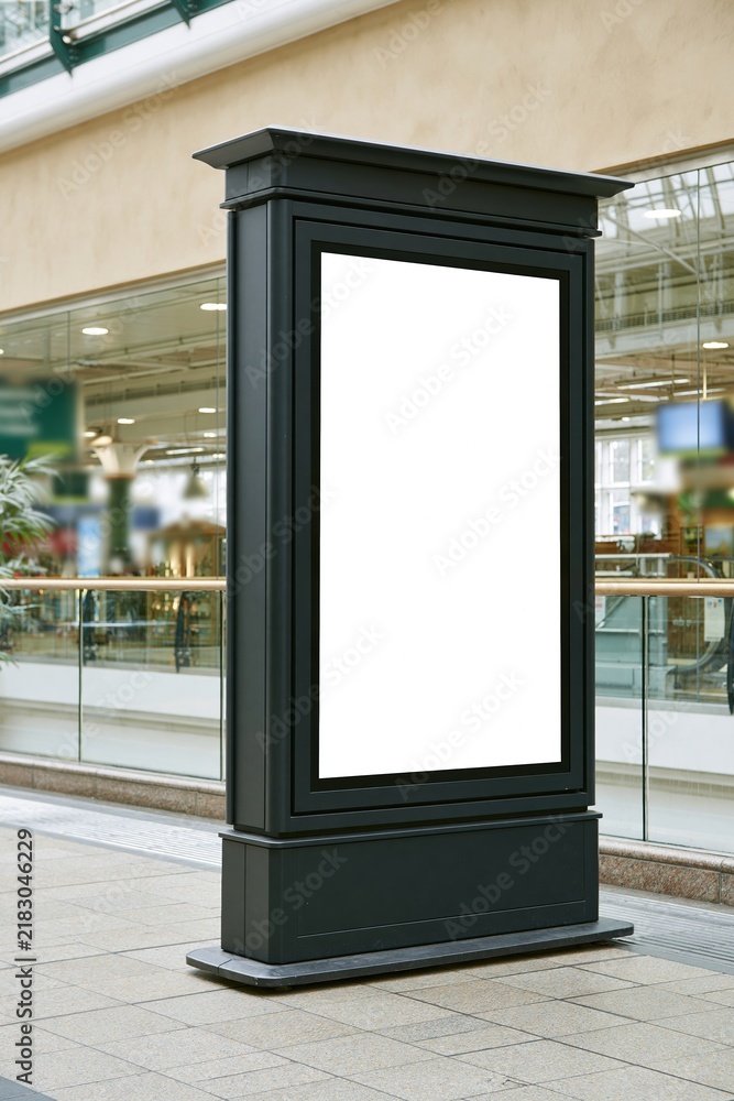 Obraz premium Empty black advertising display stand in modern shopping
