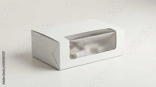 Small white cardboard box with a clear plastic window for food packaging and retail product display. frosted window packaging
