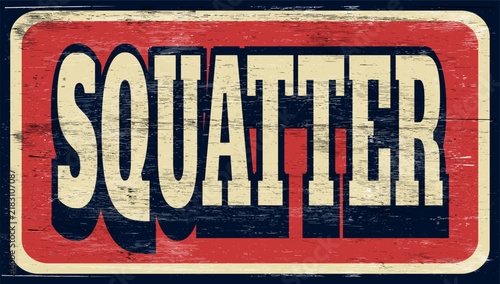 Aged retro squatter sign on wood