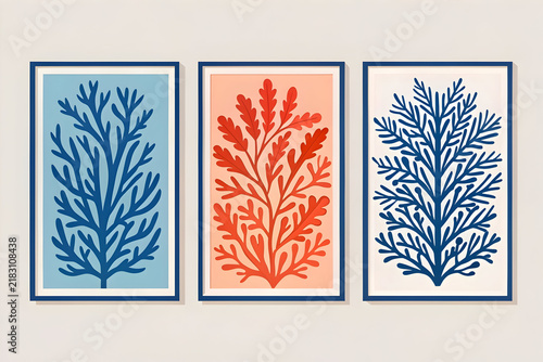 Minimalist botanical wall art set, three framed coral and seaweed illustrations, modern coastal gallery prints in blue and terracotta orange