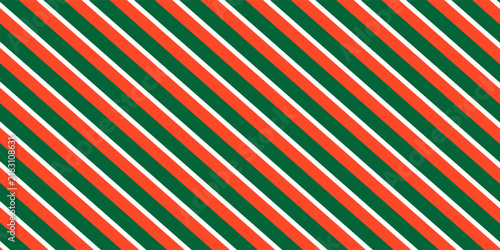 Christmas seamless pattern. Red and green diagonal stripes background. Candy cane repeating decoration wallpaper. Winter holiday lines backdrop. Xmas peppermint package wrapping print design. 
