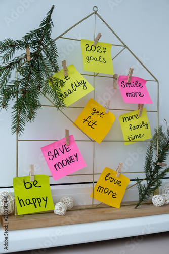 2027 goals Action board new year's resolutions on colorful sticky notes. Making promises for new year, setting goals. Dream year motivation