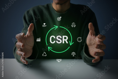 Hands Cupping Floating CSR Hologram with Circular Icons on Dark Background