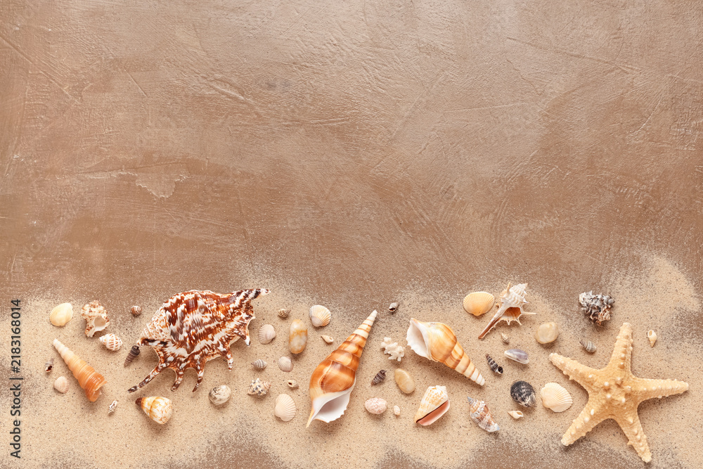 Obraz premium Summer vacation and travel concept, seashells and starfish on sand with copy space for holiday background and tropical beach tourism advertisement