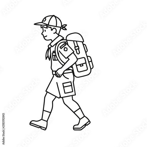 Scout boy walking with backpack