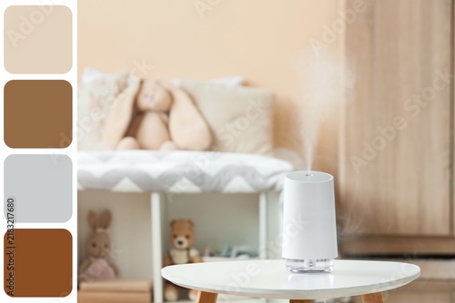 Bild auf Leinwand Air quality and wellness, ultrasonic humidifier in a nursery room for healthy br