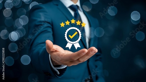 Businessman Hand Holding a Five Star Quality Assurance Badge Symbolizing Professional Excellence and Customer Satisfaction