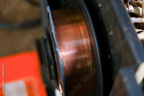 Fotografie Copper coil speaker component close view electronic equipment metal wire, detail