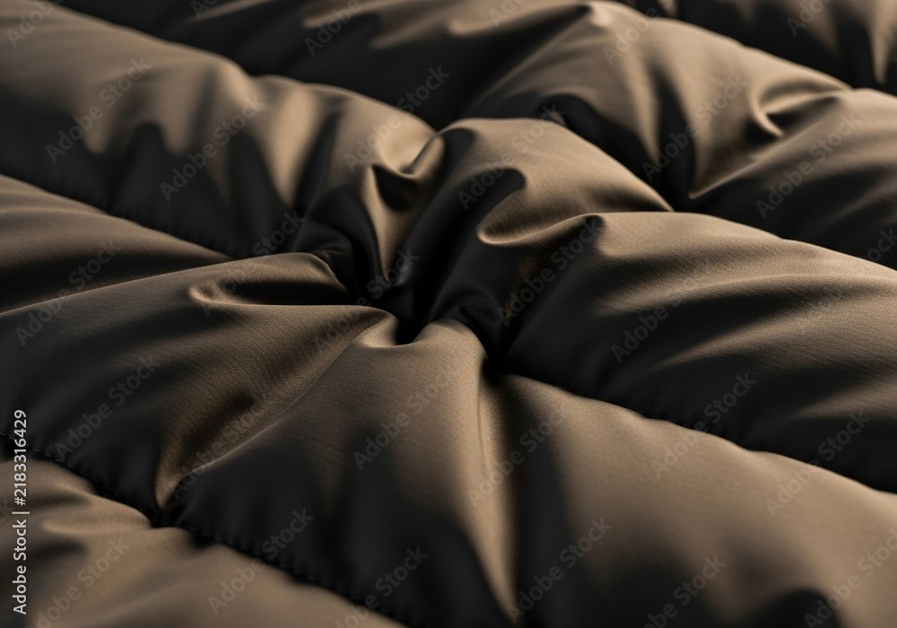 Naklejka premium Dark brown quilted fabric texture with soft folds and shadows.