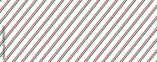 Green and red lines cross each other in rhombus shape. Christmas pattern background.