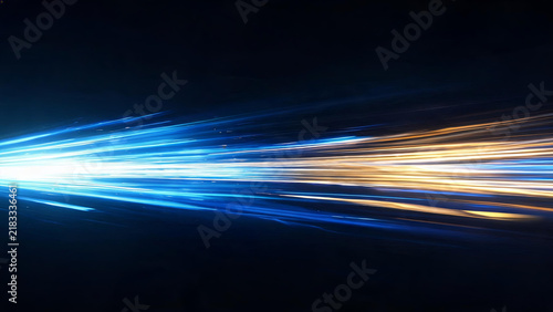 Bright blue and golden light streaks move rapidly across a dark backdrop, creating a dynamic, high-tech abstract visual effect.