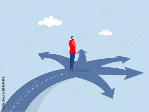 businessman standing in front of a crossroad with road split in multi different ways as arrows.