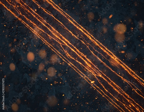 Abstract background with glowing orange lava streams flowing over dark volcanic rock texture