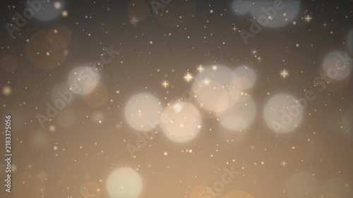 幻想的に輝く光の粒子と玉ボケが浮遊するダークゴールドとブロンズのシームレスループ動画素材/ Abstract glowing particles and bokeh loop on dark gold and bronze background